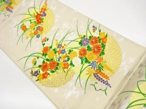 丸文に草花模様織出し袋帯